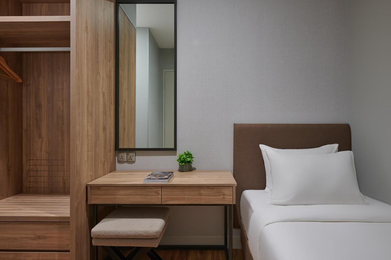 Mercure Living プトラジャヤ エクステリア 写真 A bedroom at the hotel
