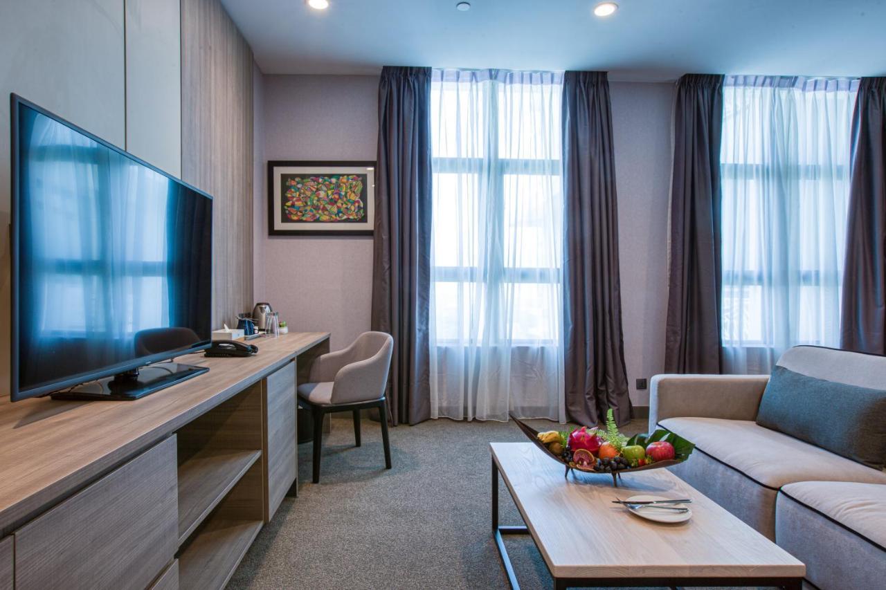 Mercure Living プトラジャヤ エクステリア 写真 A living room in a serviced apartment in Moscow, Russia