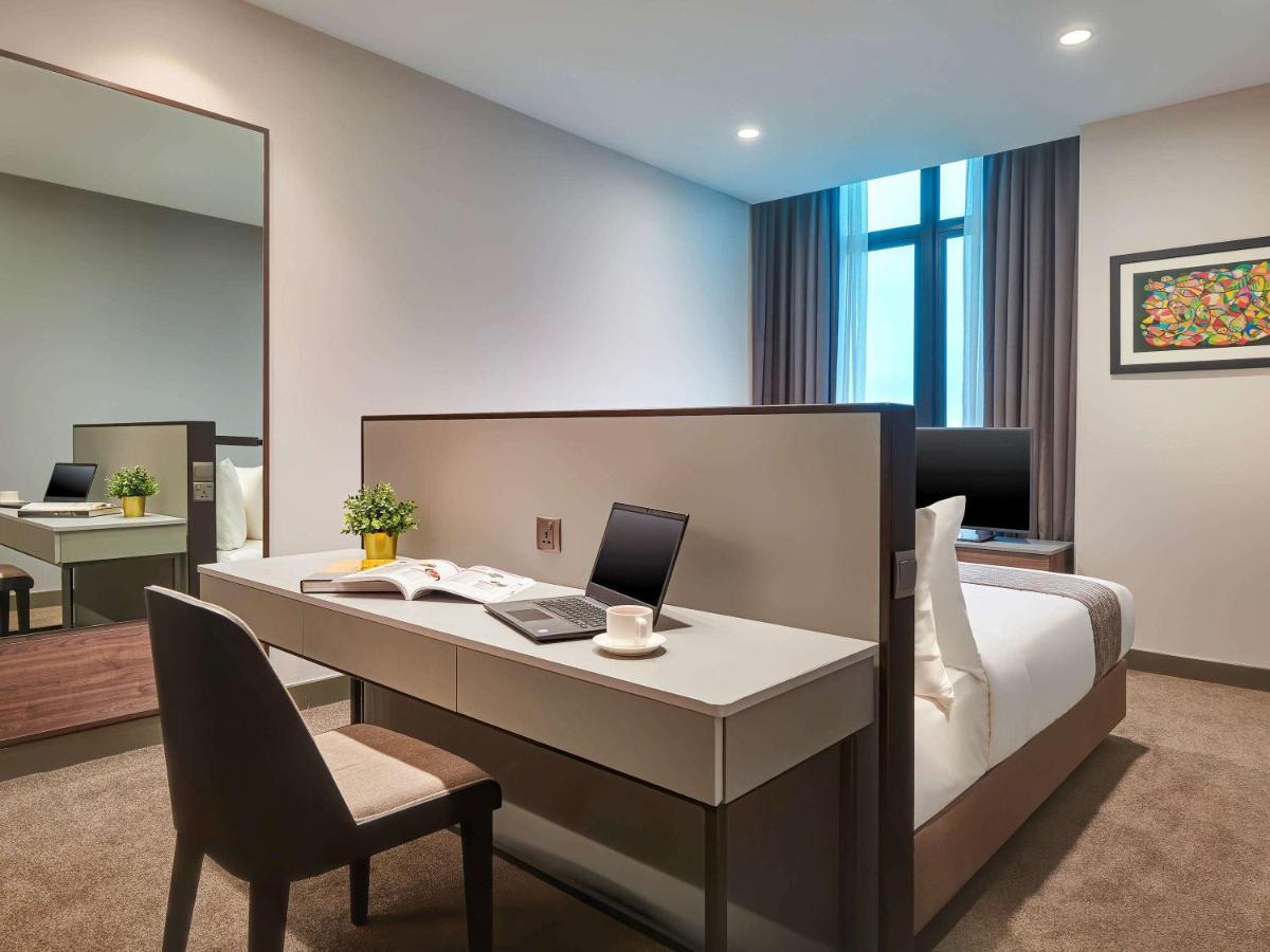 Mercure Living プトラジャヤ エクステリア 写真 A bedroom at the hotel